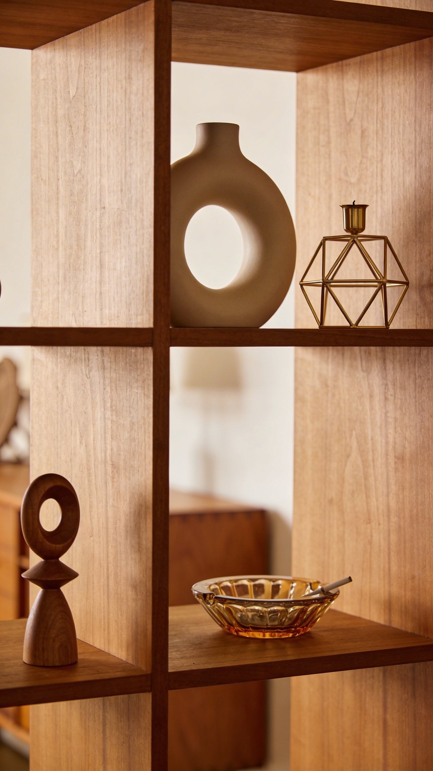 Shelving unit showcasing mid-century decor pieces