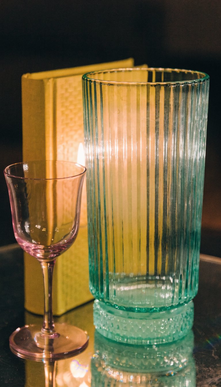 mint, blush, yellow book trio with candle glow